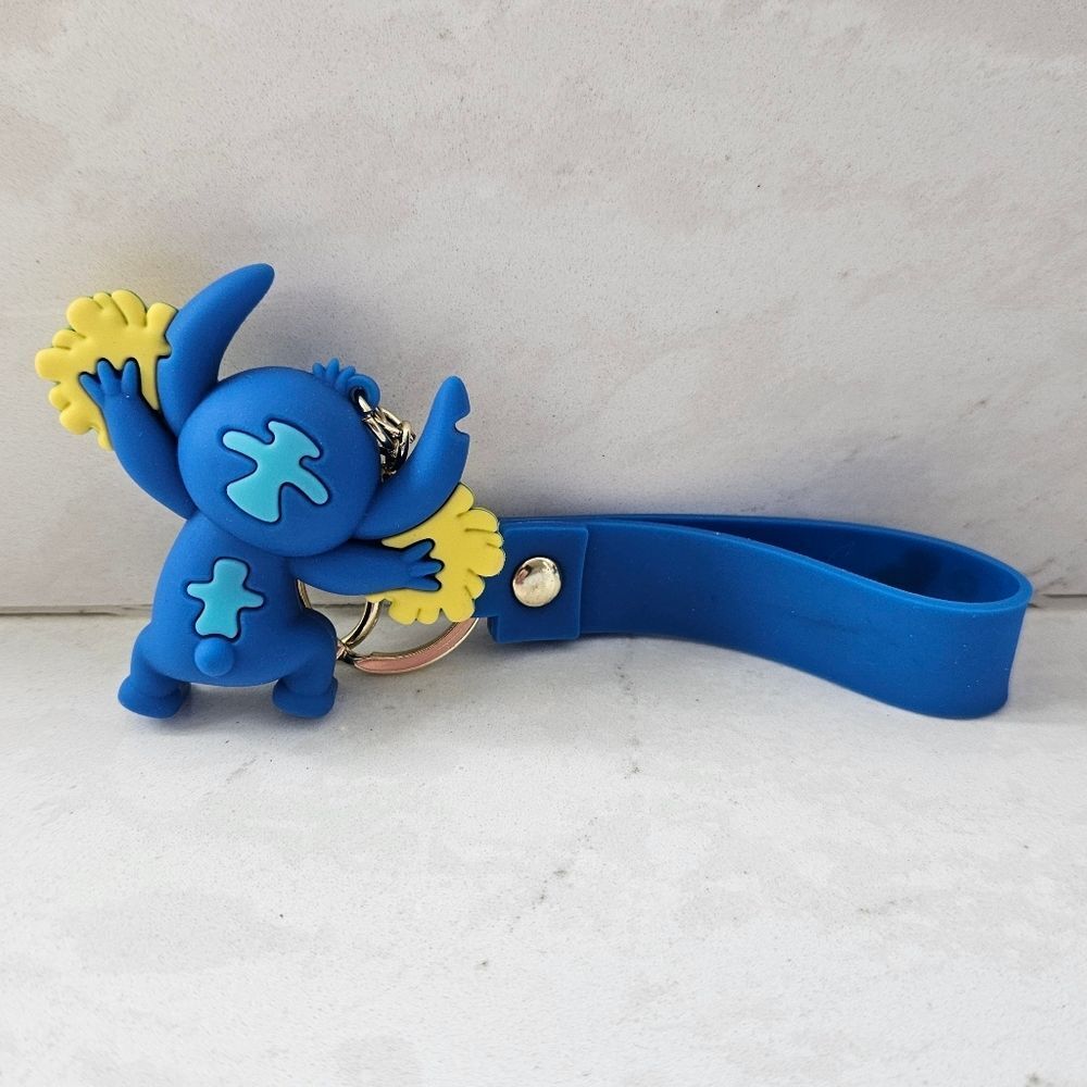 Stitch With Pom Poms Blue and Yellow Keychain Toy - Picture 5 of 5